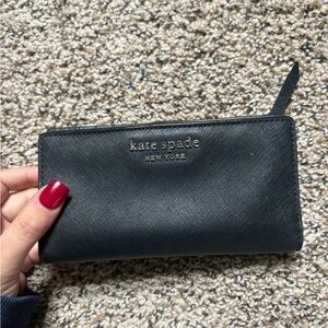 kate spade black zip-around saffiano wallet with gold logo